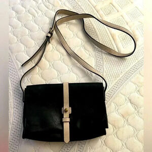 Express cross body, never used black and cream